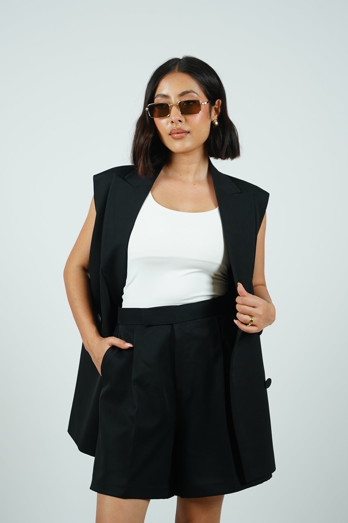 Black Sleeveless Blazer With Shorts